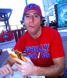 Lee eats champion cheesesteaks (and makes a funny face) @ 2008 WS championship parade phinale!