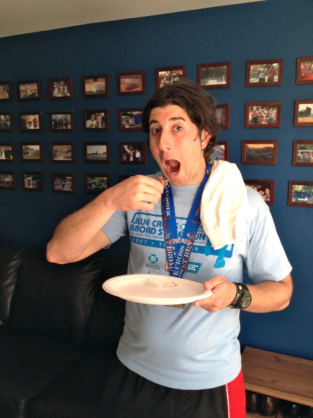 Lee eats chocolate-covered-pork post-Broad Street Run - Thanks, Anthony! (Philly)