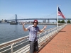 Lee shrugs at the Ben Franklin Bridge