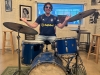 Drummer Lee shrugs at Sun Studio (Memphis TN)